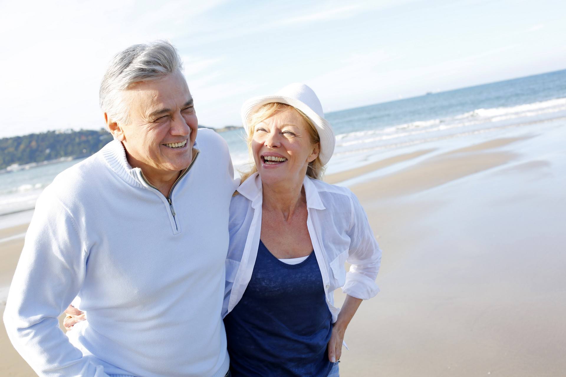 Permanent dentures supported by dental implants